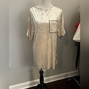 Elegant Cream Dress with Black Trim